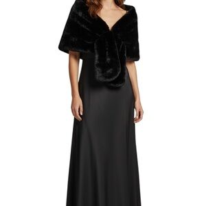 Black faux fur shawl-style jacket or coat.